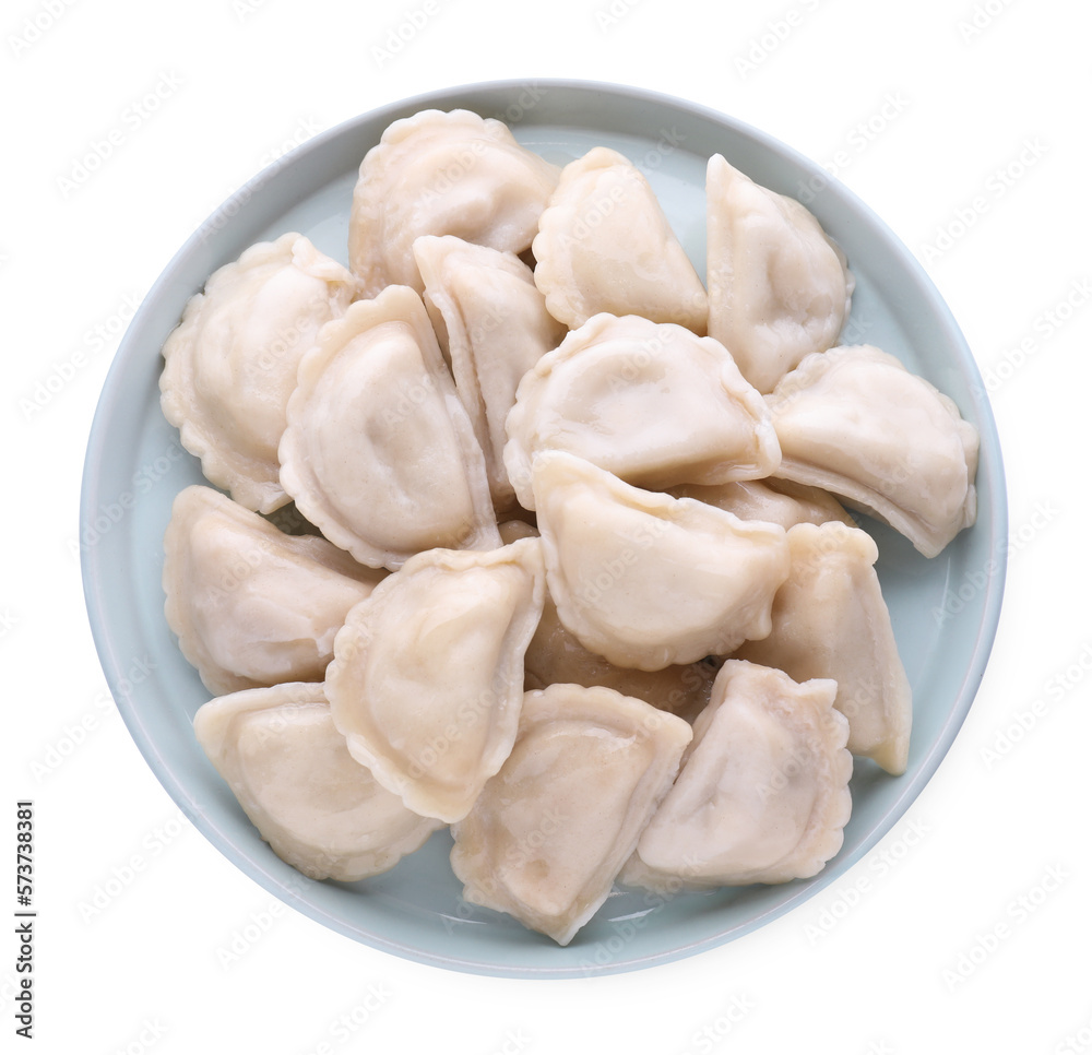 Plate with tasty dumplings (varenyky) on white background, top view
