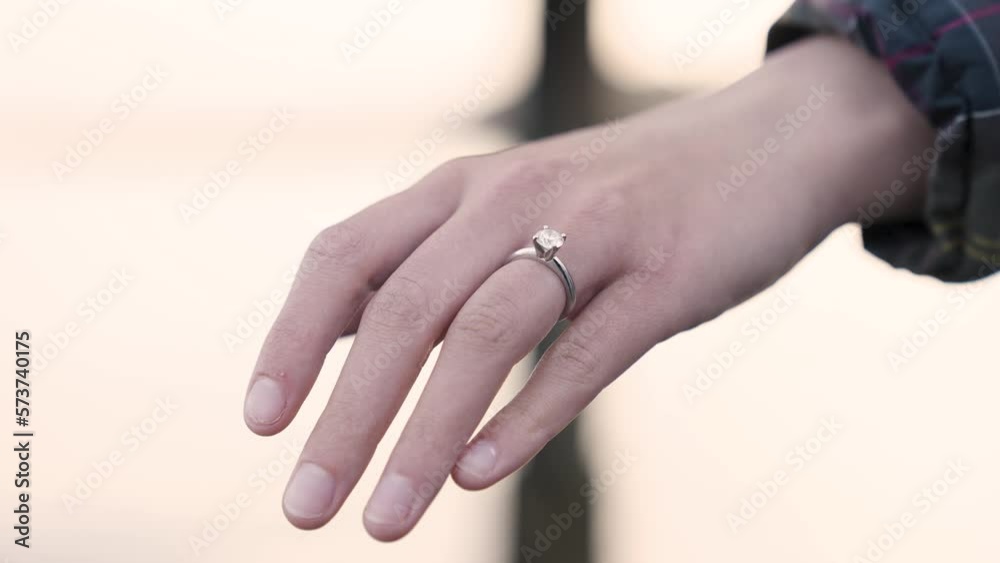Happy Preppy Romantic Young White Couple during Sunset Golden Hour by the Ocean - engagement ring Happy Preppy Romantic Young White Couple during Sunset Golden Hour by the Ocean - engagement ring