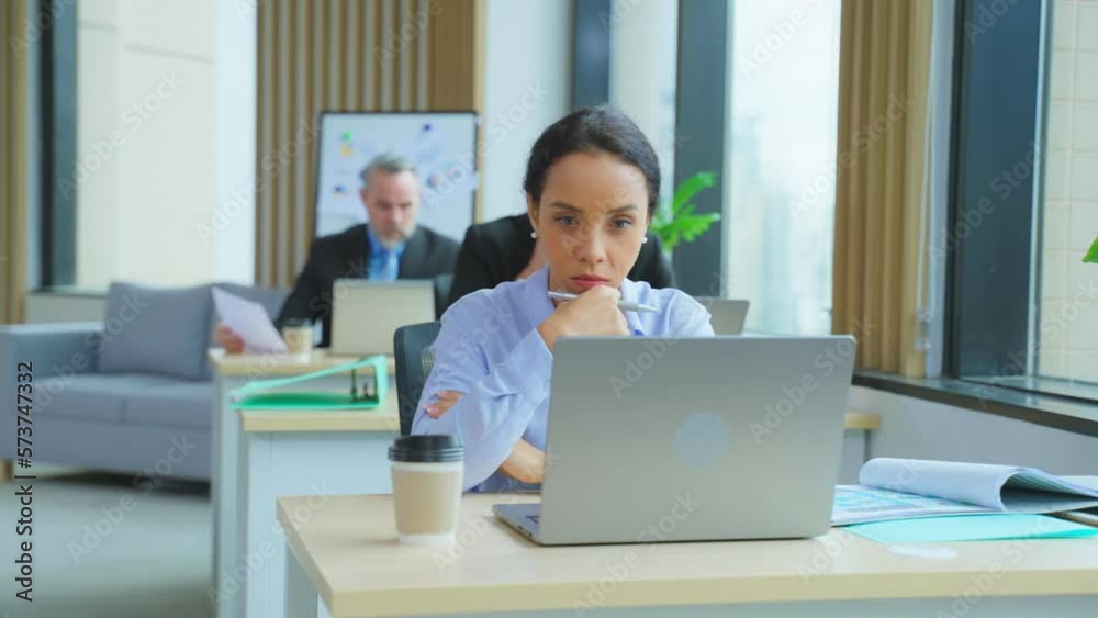 Latino young beautiful businesswoman working in the office workplace. Latino young beautiful businesswoman working in the office workplace.
