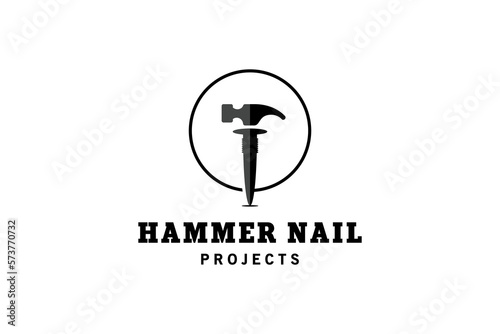 Hammer and nails vector logo design with silhouette in circle
