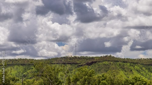 Timelapse of storm clouds over a mountain with a telecommunication tower in the Northern Territory photo