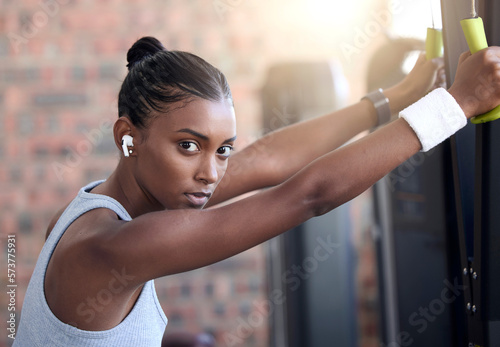 Fitness, exercise and portrait of a woman with music at gym for health and wellness with training workout. Indian athlete person listening to earphones for motivation and inspiration to train body Free Download Fitness, exercise and portrait of a woman with music at gym for health and wellness with training workout. Indian athlete person listening to earphones for motivation and inspiration to train body - GFXLoad