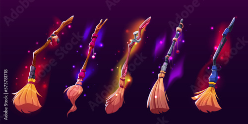 Cartoon set of witch broomsticks isolated on dark background. Vector illustration of magic flight transport with wooden handle glowing with neon colors, sparkles. Witchcraft accessory. Halloween item