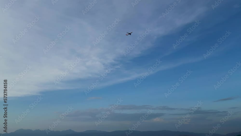 Drone view of a passenger plane taking off. Langkawi island coast. Malaysia Drone view of a passenger plane taking off. Langkawi island coast. Malaysia