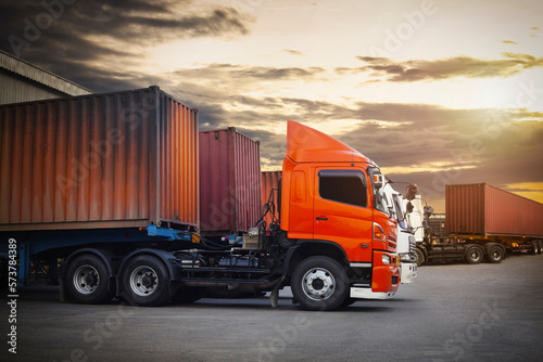 Semi Trailer Trucks Parked Loading at Dock Warehouse. Shipping Cargo Container Delivery Trucks. Loading Distribution Warehouse. Freight Trucks Cargo Transport. Warehouse Logistics. 