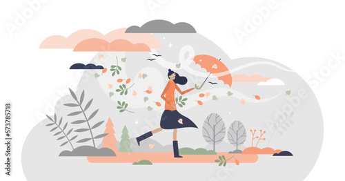 Autumn season with leaves fall and windy weather walk tiny persons concept, transparent background. Outdoor environment scene with seasonal forecast and fashion girl with umbrella illustration.