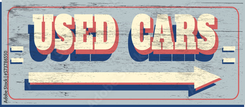 Vintage used cars sign on wood