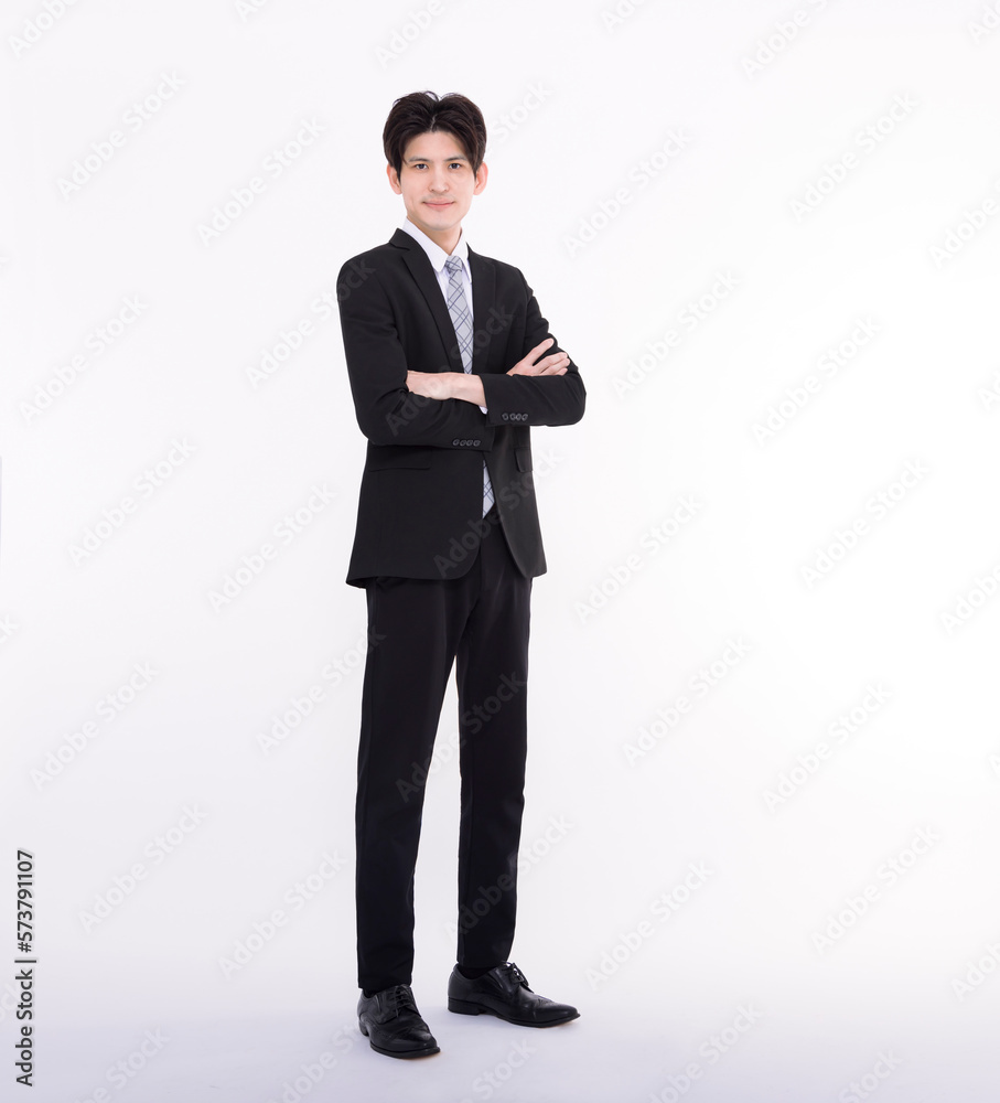 Full length portrait of young businessman standing Full length portrait of young businessman standing