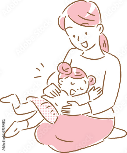 女の子を膝の上に乗せてスキンシップをする若いお母さん