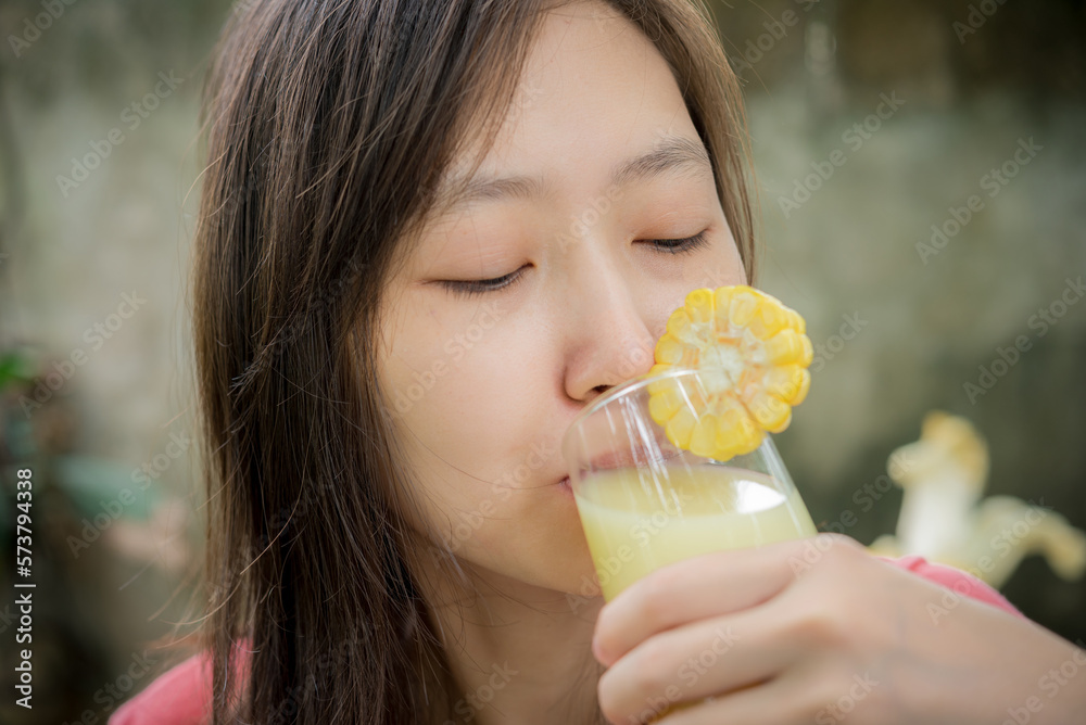 women drinking healthy drink,corn milk juice women drinking healthy drink,corn milk juice