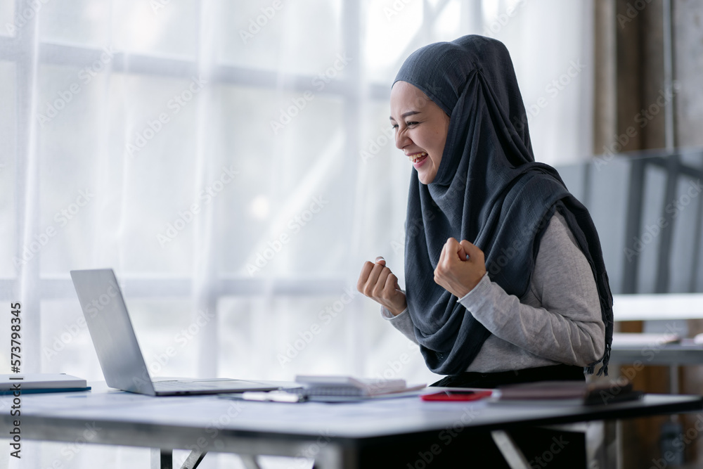 Excited muslim woman sit at desk feel euphoric win online lottery, happy black woman overjoyed get mail at tablet being promoted at work, biracial girl amazed read good news at computer