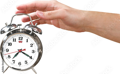 Man holding alarm clock in hand isolated on white background