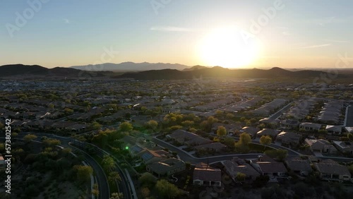 Panning aerial view of the Vistancia planned neighborhood in Peoria, Arizona at sunset. photo