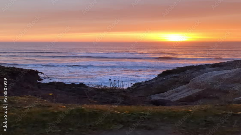 sunset over the Pacific Ocean, sunset in Half Moon Bay State Beach cliff side landscape sunset over the Pacific Ocean, sunset in Half Moon Bay State Beach cliff side landscape