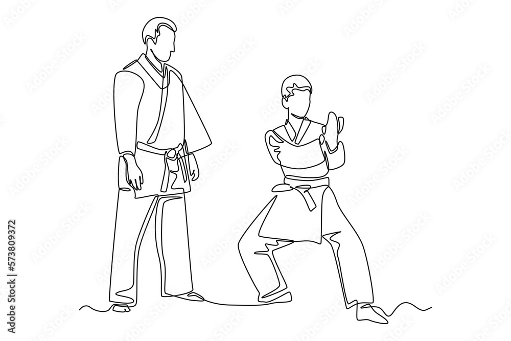 Continuous one line drawing Trainer is training children in karate class. Class in action concept. Single line draw design vector graphic illustration.