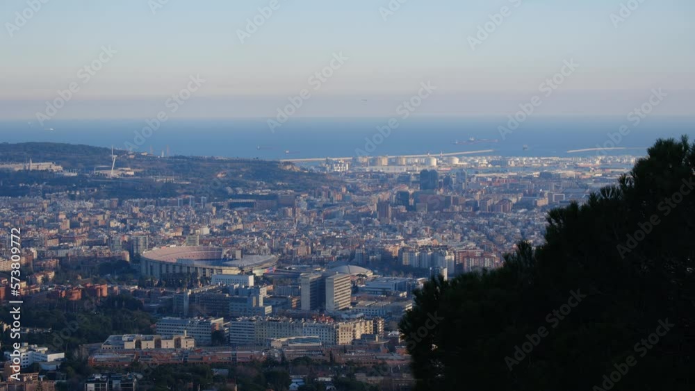 Enjoy a breathtaking panoramic view of the city of Barcelona that will leave you speechless. Observe the majesty of its iconic buildings, its blue sky, and the Mediterranean Sea, all in one image. Enjoy a breathtaking panoramic view of the city of Barcelona that will leave you speechless. Observe the majesty of its iconic buildings, its blue sky, and the Mediterranean Sea, all in one image.