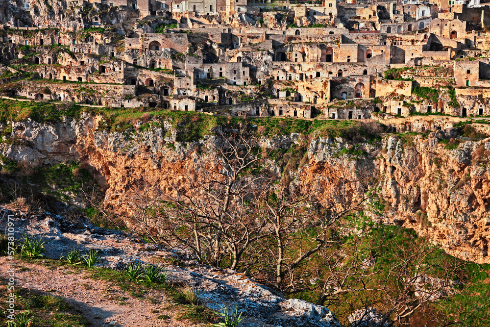 Matera, Basilicata, Italy: landscape of the old town called Sassi with the ancient cave houses above the deep ravine
