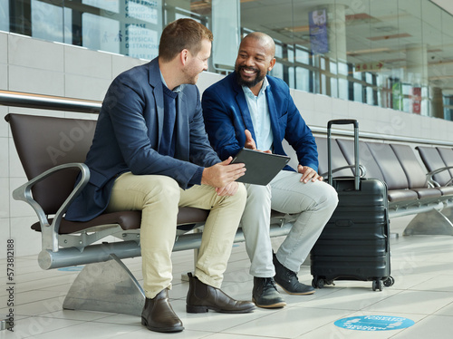 Airport, tablet and business people or partner flight booking, online travel news or digital schedule management app. Communication, lobby and tech of international black man with immigration advice