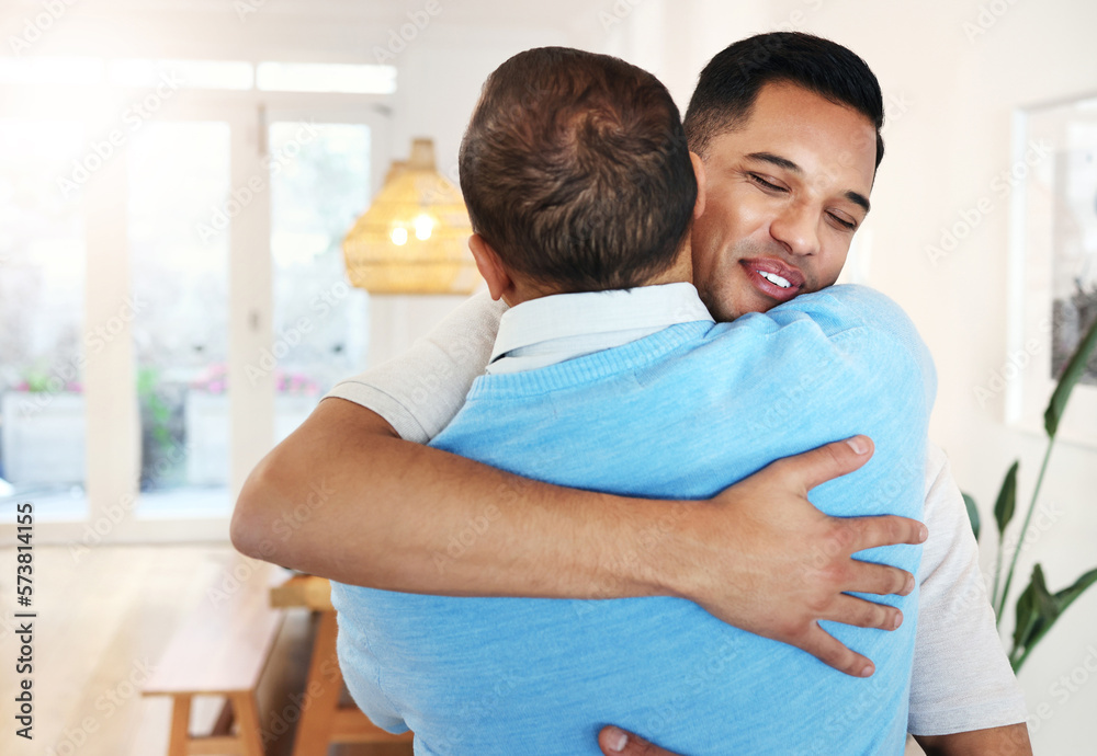 Love, care and father and son with a hug for a visit, bonding and quality time. Happy, affection and dad hugging a man with an embrace after reunited, missing or showing appreciation in a home Love, care and father and son with a hug for a visit, bonding and quality time. Happy, affection and dad hugging a man with an embrace after reunited, missing or showing appreciation in a home