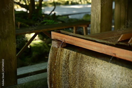 Hand wash at shrine
薄暗い神社にある手水舎