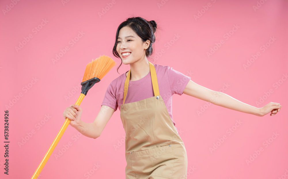 Young Asian woman housewife on background
