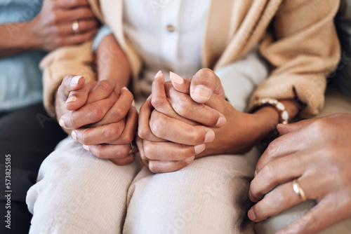 Holding hands, support and love with trust, help and comfort people with empathy and care with grief. Parents helping adult child, connection and solidarity with relationship, commitment and zoom photo
