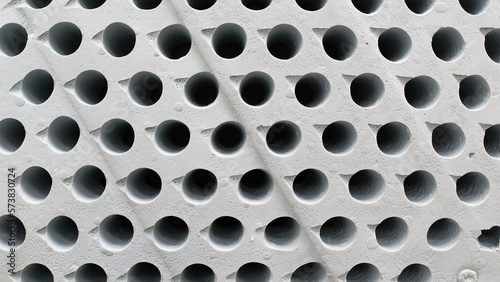 porous poriferous material for air ventilation with holes photo