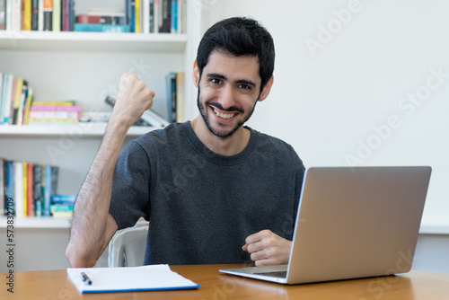 Fotografie Successful israeli IT specialist at work at computer