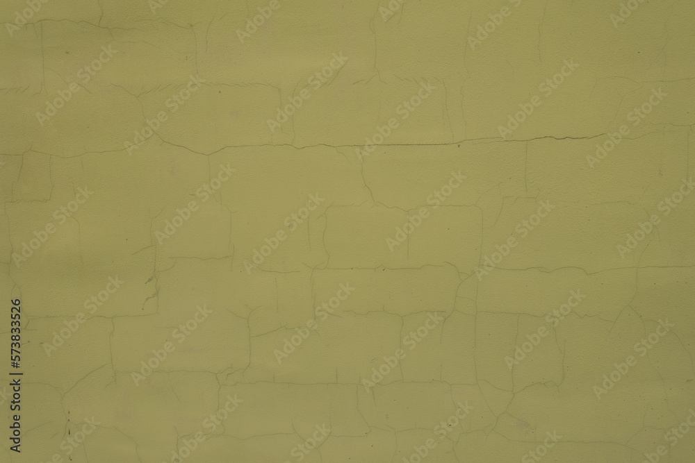 Texture of greenish yellow painted wall with cracks Texture of greenish yellow painted wall with cracks