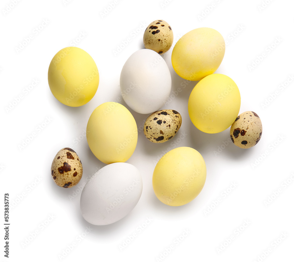 Natural and painted Easter eggs on white background Natural and painted Easter eggs on white background