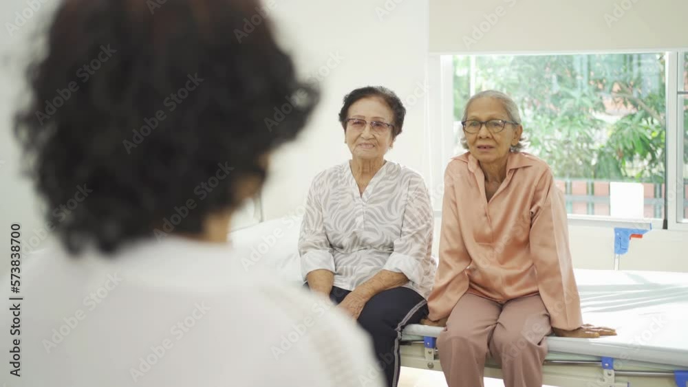 Portrait of happy group of old elderly Asian patient or pensioner people smiling, relaxing, having fun together in nursing home. Senior lifestyle activity recreation. Retirement community. Health care Portrait of happy group of old elderly Asian patient or pensioner people smiling, relaxing, having fun together in nursing home. Senior lifestyle activity recreation. Retirement community. Health care