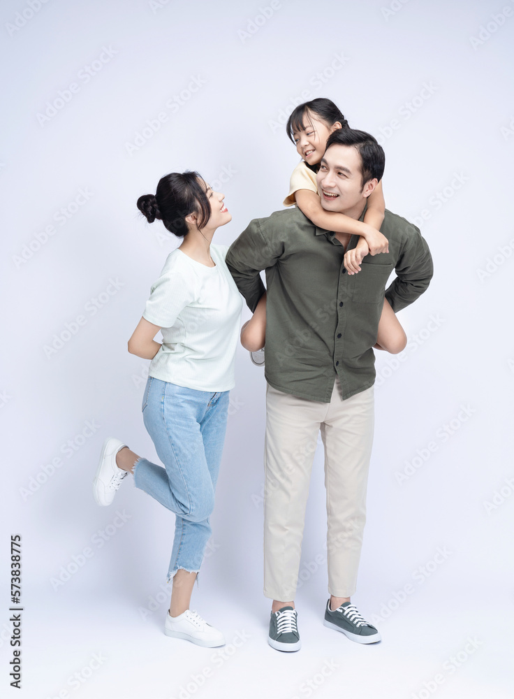 Image of Asian family on background