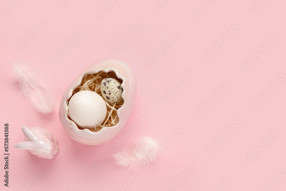 Decorative shell with Easter eggs and bunny on pink background