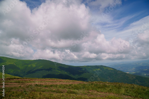 Beautiful summer mountain landscape, forest, clouds. Mount Gemba Pylypets Ukraine. Ukrainian mountains Carpathians, Transcarpathia