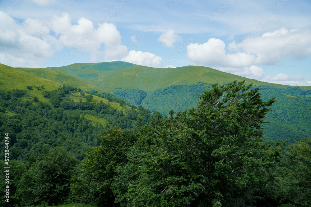 Beautiful summer mountain landscape, forest, clouds. Mount Gemba Pylypets Ukraine. Ukrainian mountains Carpathians, Transcarpathia Beautiful summer mountain landscape, forest, clouds. Mount Gemba Pylypets Ukraine. Ukrainian mountains Carpathians, Transcarpathia