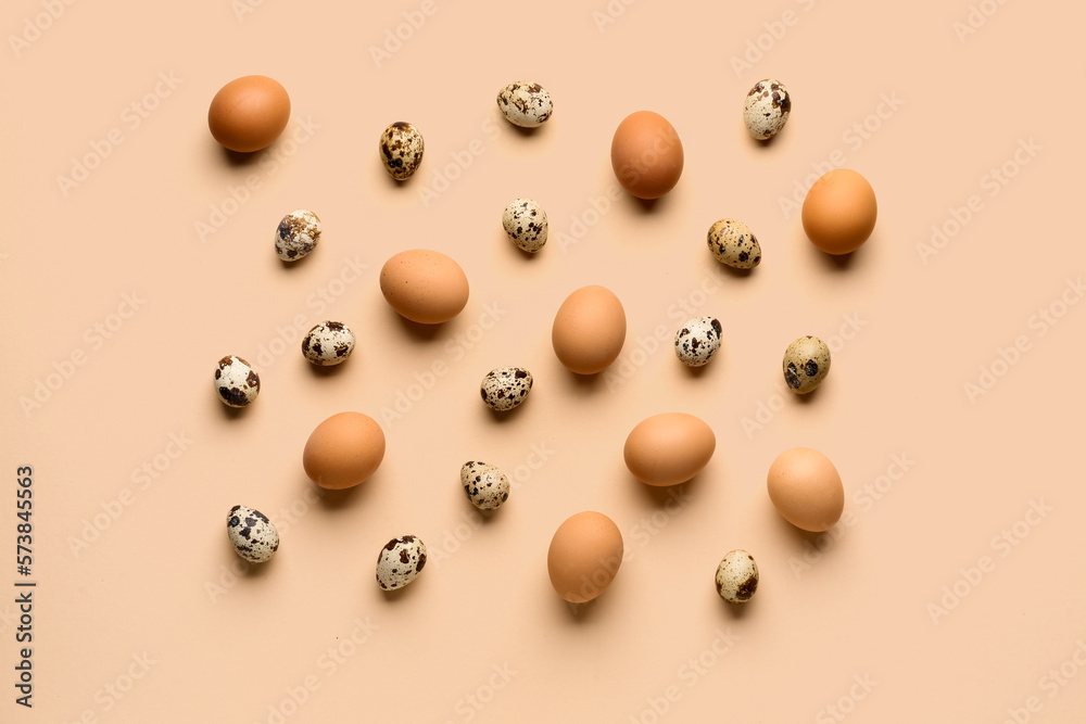 Many Easter eggs on beige background