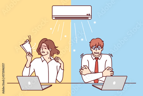 Man and woman sitting at table under air conditioner experience discomfort due to different perceptions of climate. Using office air conditioner to keep warm in winter or cool in summer climates 