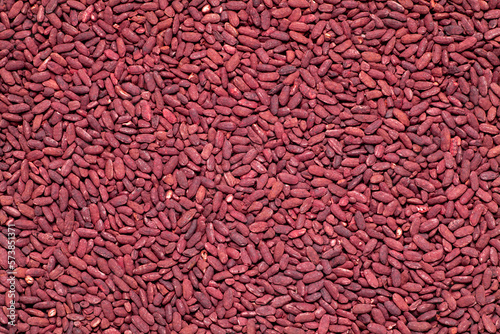 Background of red yeast rice. Chinese traditional food and medicine. photo
