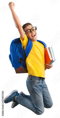 Happy young school child with backpack jumping