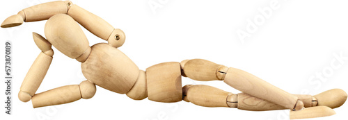 Miniature wooden mannequin in a laying down pose photo