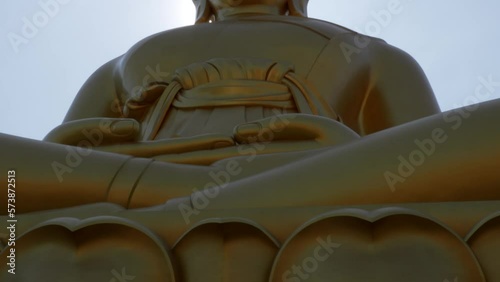 Giant dolgen Buddha at Wat Paknam Bhasicharoen Thailand tilt shot photo