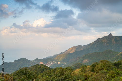 Colorful clouds in the blue sky. People feel comfortable, free and peaceful. The scenery of mountains and seas in Ruifang, New Taipei City. Taiwan