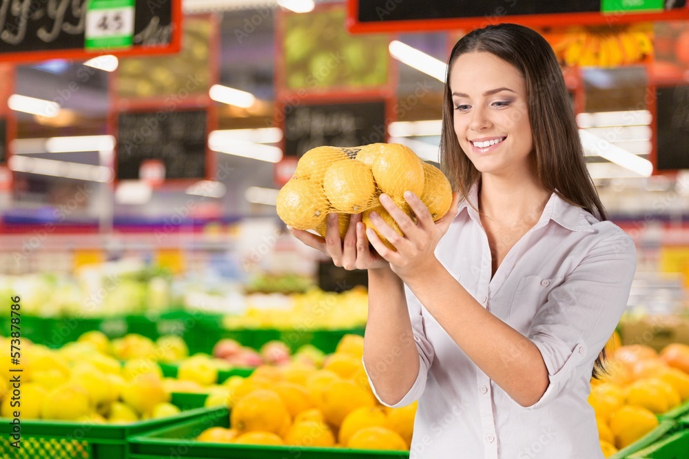 Young beautiful happy woman shopping food Young beautiful happy woman shopping food
