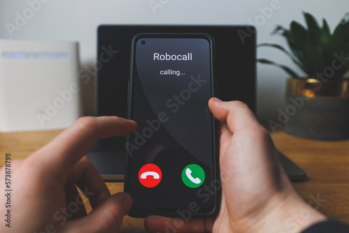 Phone call from robot. Incoming robocall Concept photo