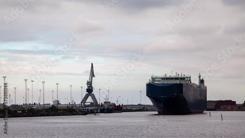 Large roll-on roll-off transport ship leaves the port of Malmo, timelapse photo