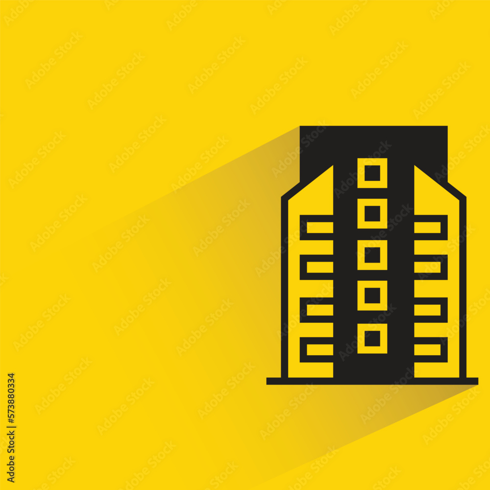 city building with shadow on yellow background city building with shadow on yellow background