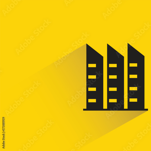 office building with shadow on yellow background