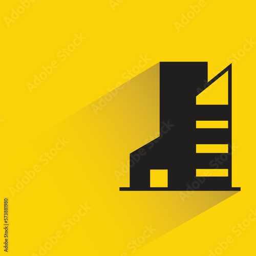 office building with shadow on yellow background