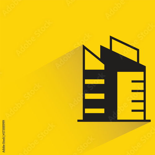 office building with shadow on yellow background