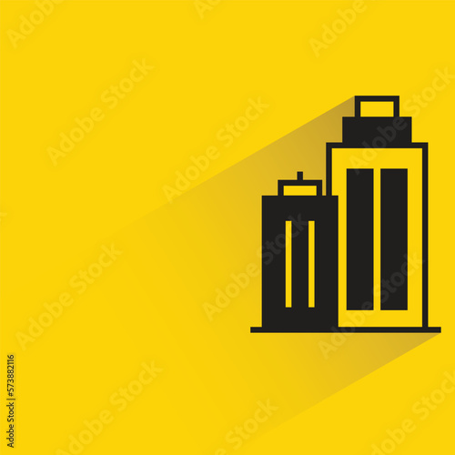 office building with shadow on yellow background